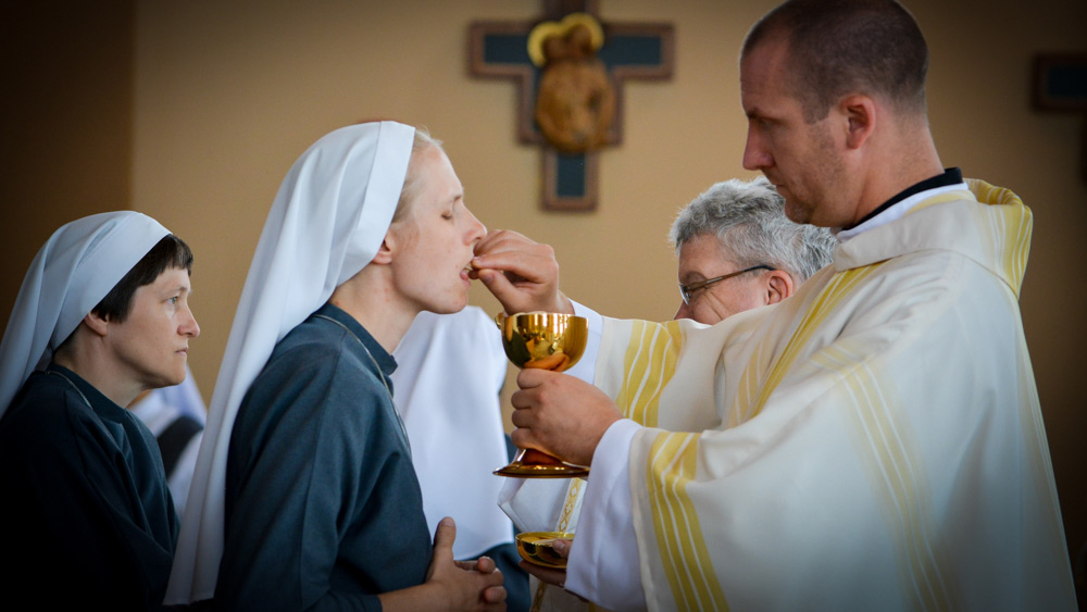 Prayer: Sr. Sophia Grace Receiving the Eucharist at Mass